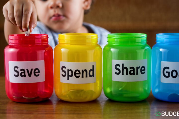 Colourful piggy bank jars labelled with key financial terms for children. money words for kids